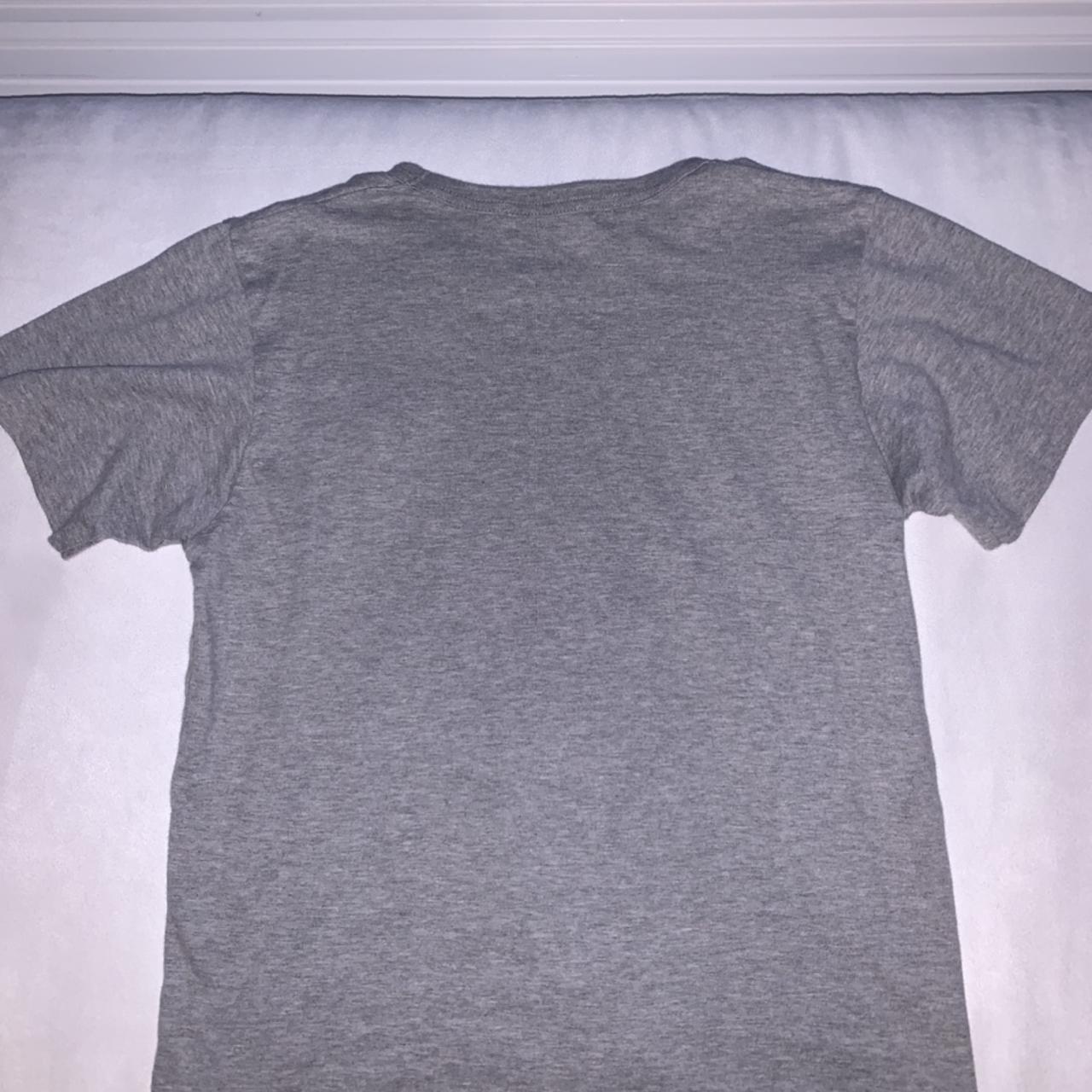 Comme des Garçons Women's Grey and Black T-shirt | Depop