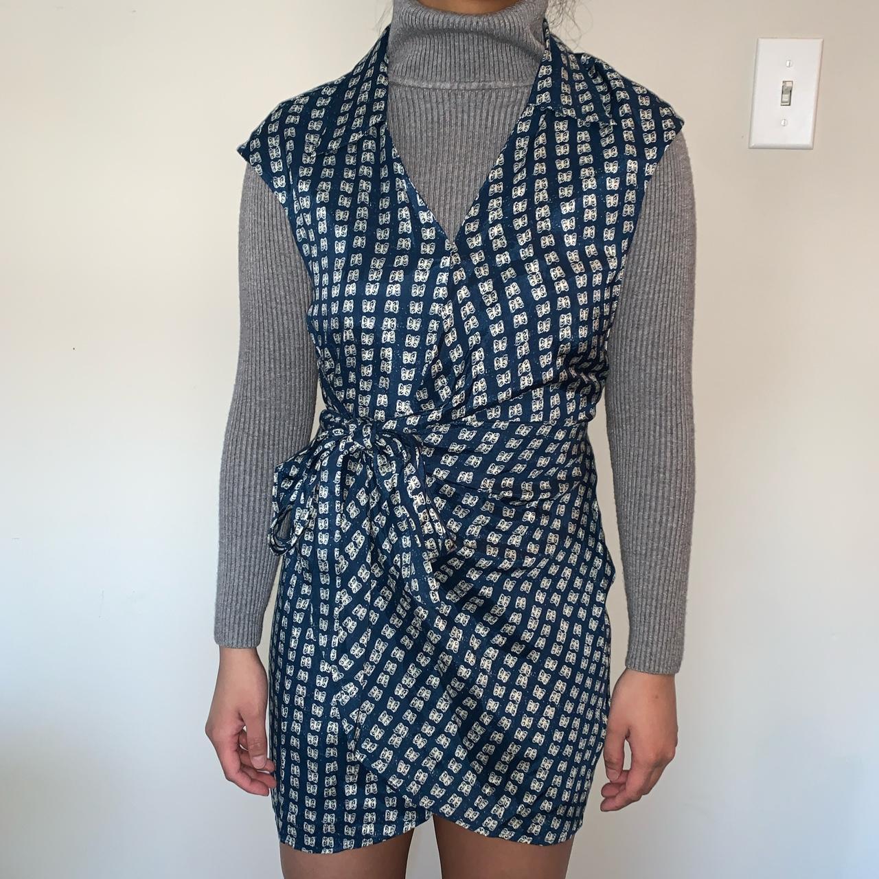 Urban Outfitters Silver Sun Navy Blue Butterfly Mini... Depop