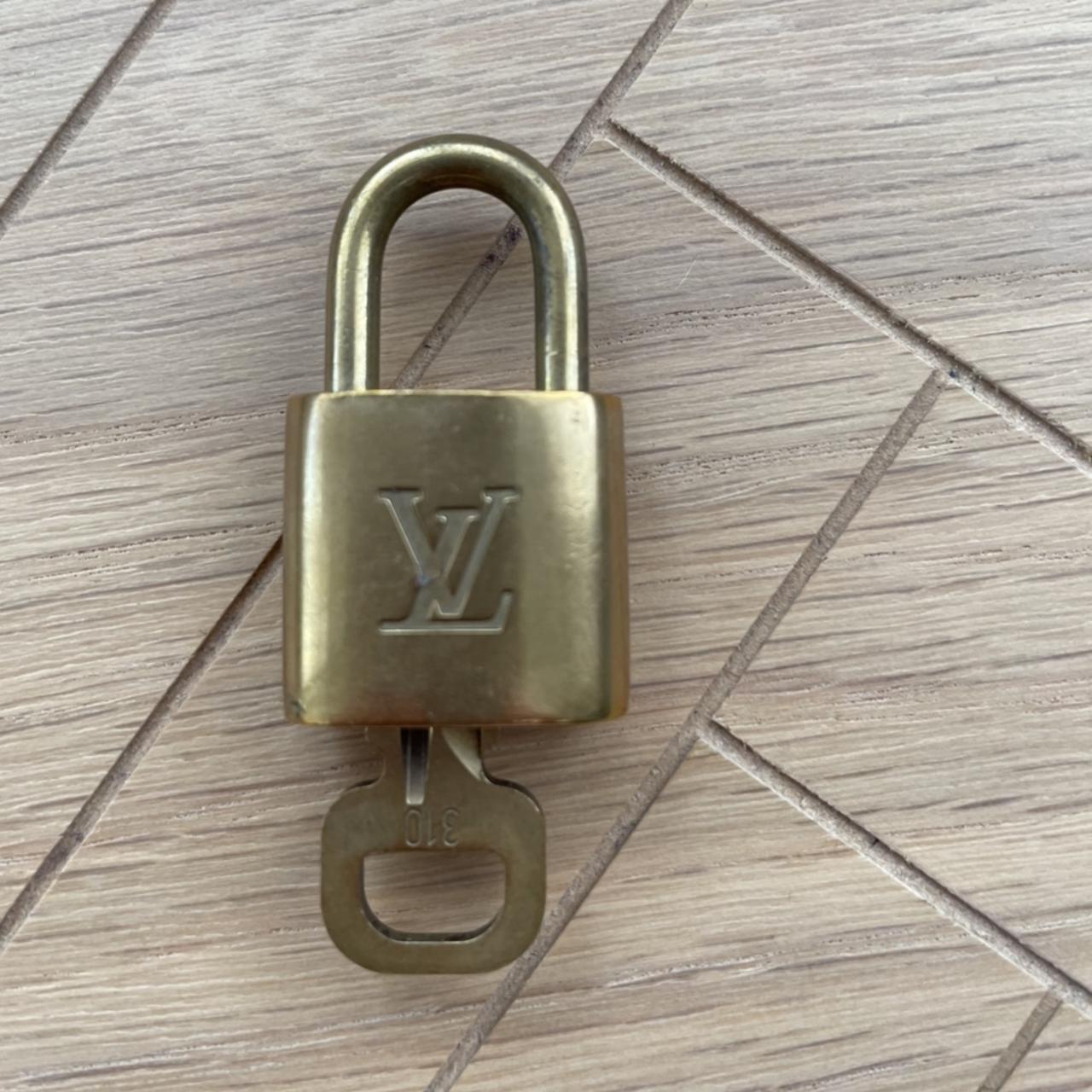 Louis Vuitton lock, in amazing condition, the spare - Depop