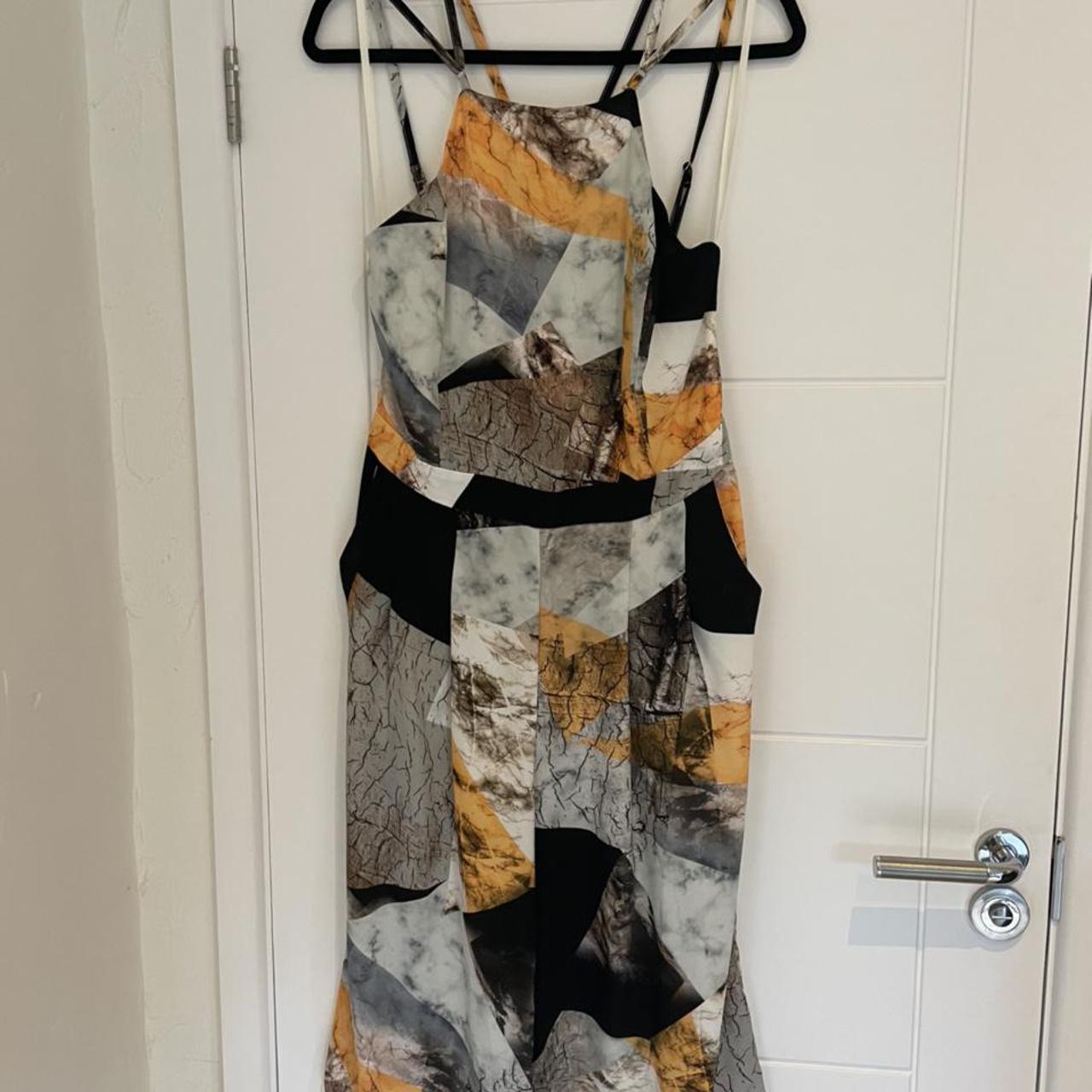 River Island Women's Black and Gold Dress Depop