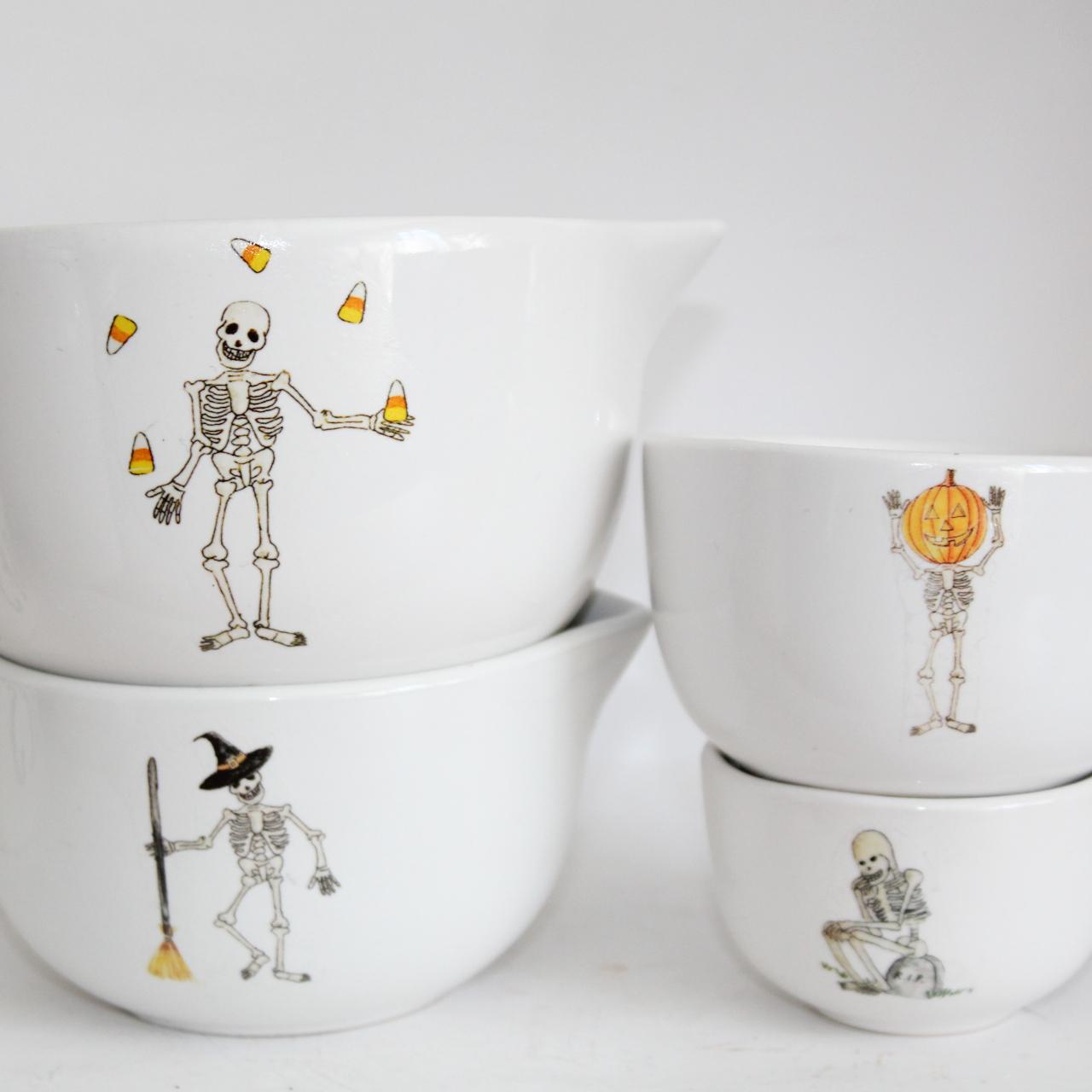 Rae Dunn deals skeleton measuring cups