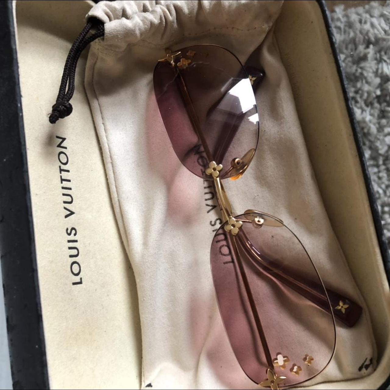 Authentic Louis Vuitton Sunglasses. Normal signs of - Depop