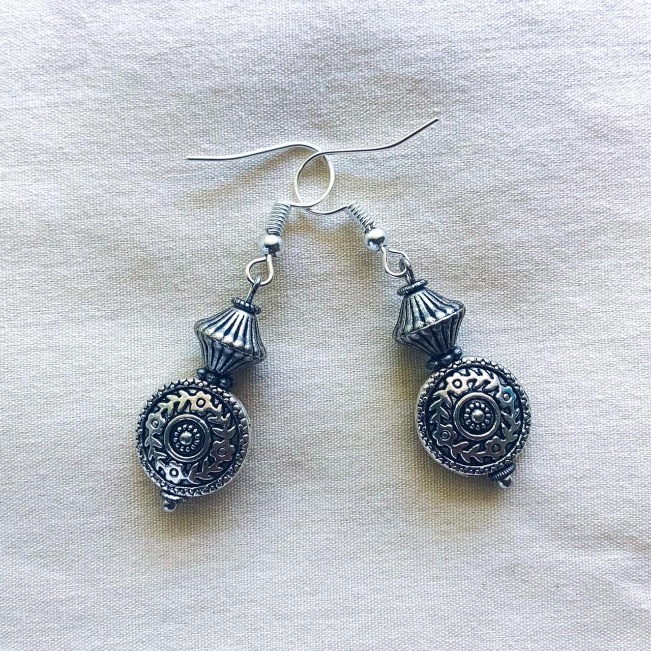 the silver medallion drops • the antique silver... - Depop