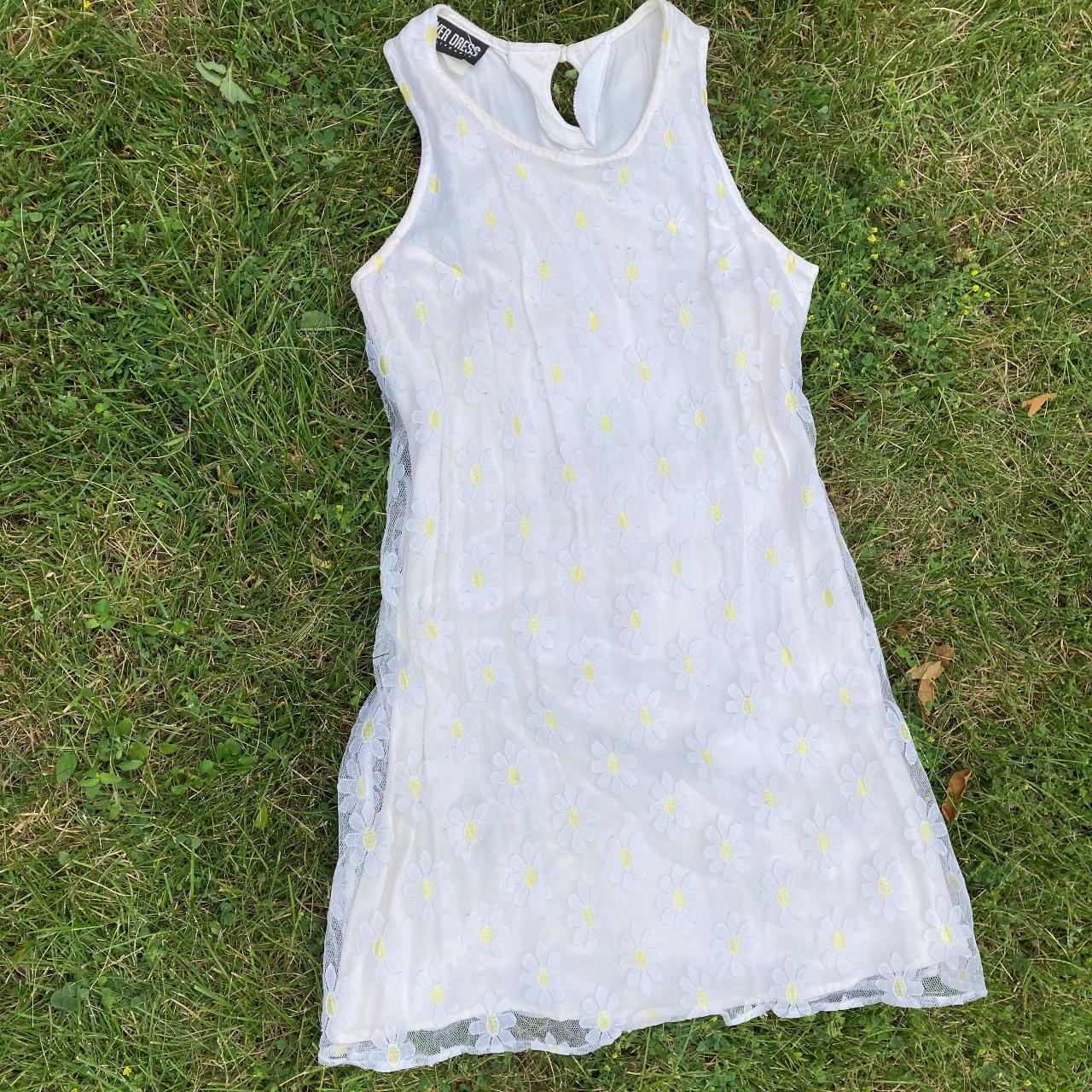 90's daisy overlay mini shift dress. Ties at the... Depop