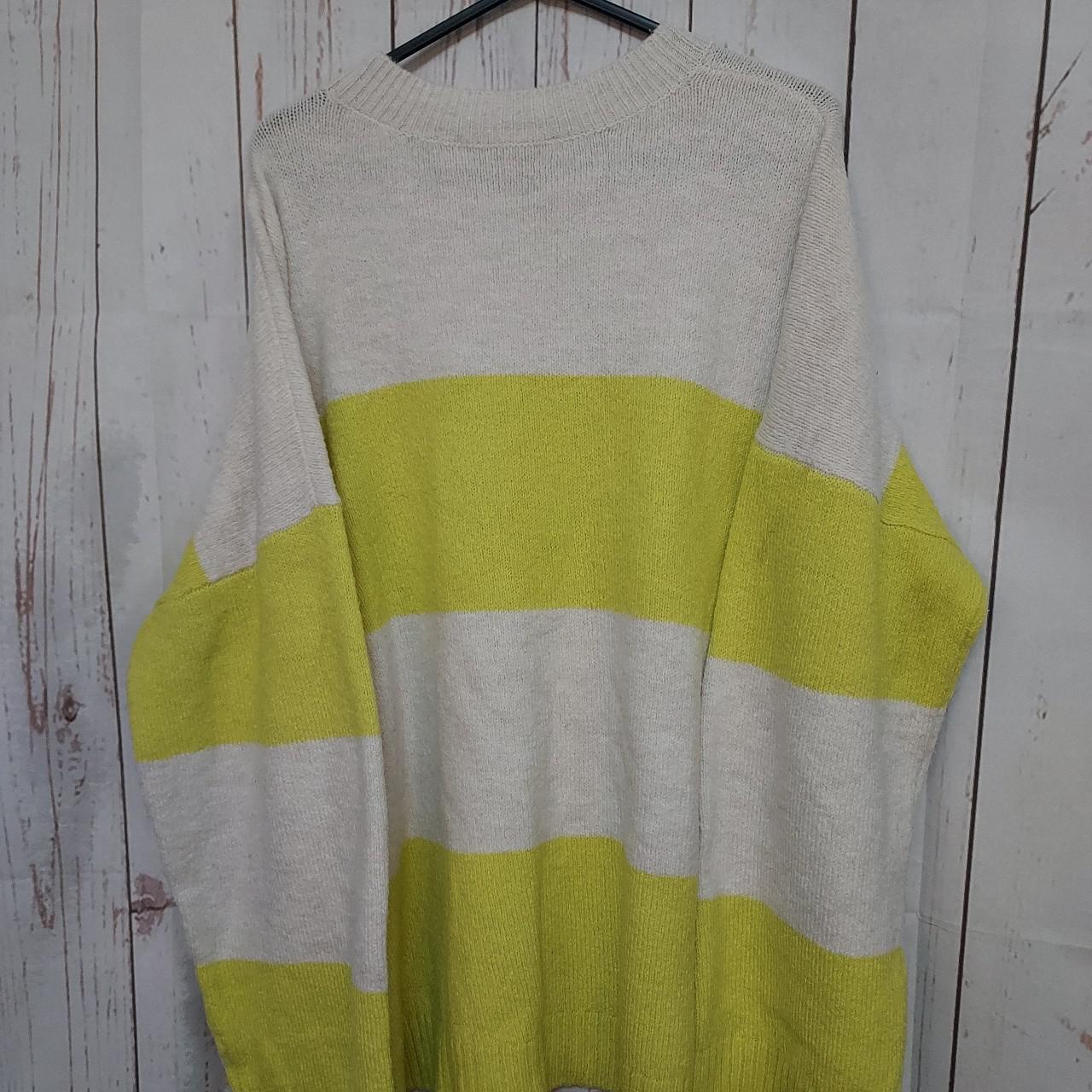Big baggy jumper in a lemon and white...its a good... Depop