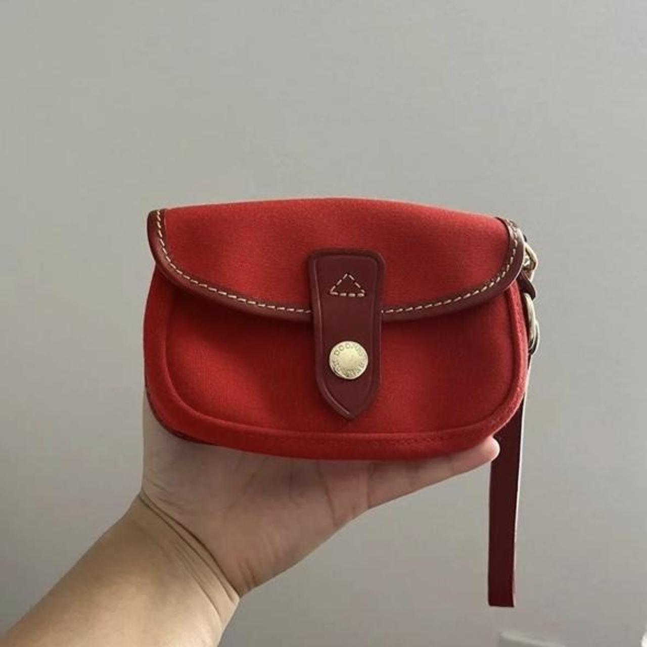 Dooney and bourke flap on sale wristlet