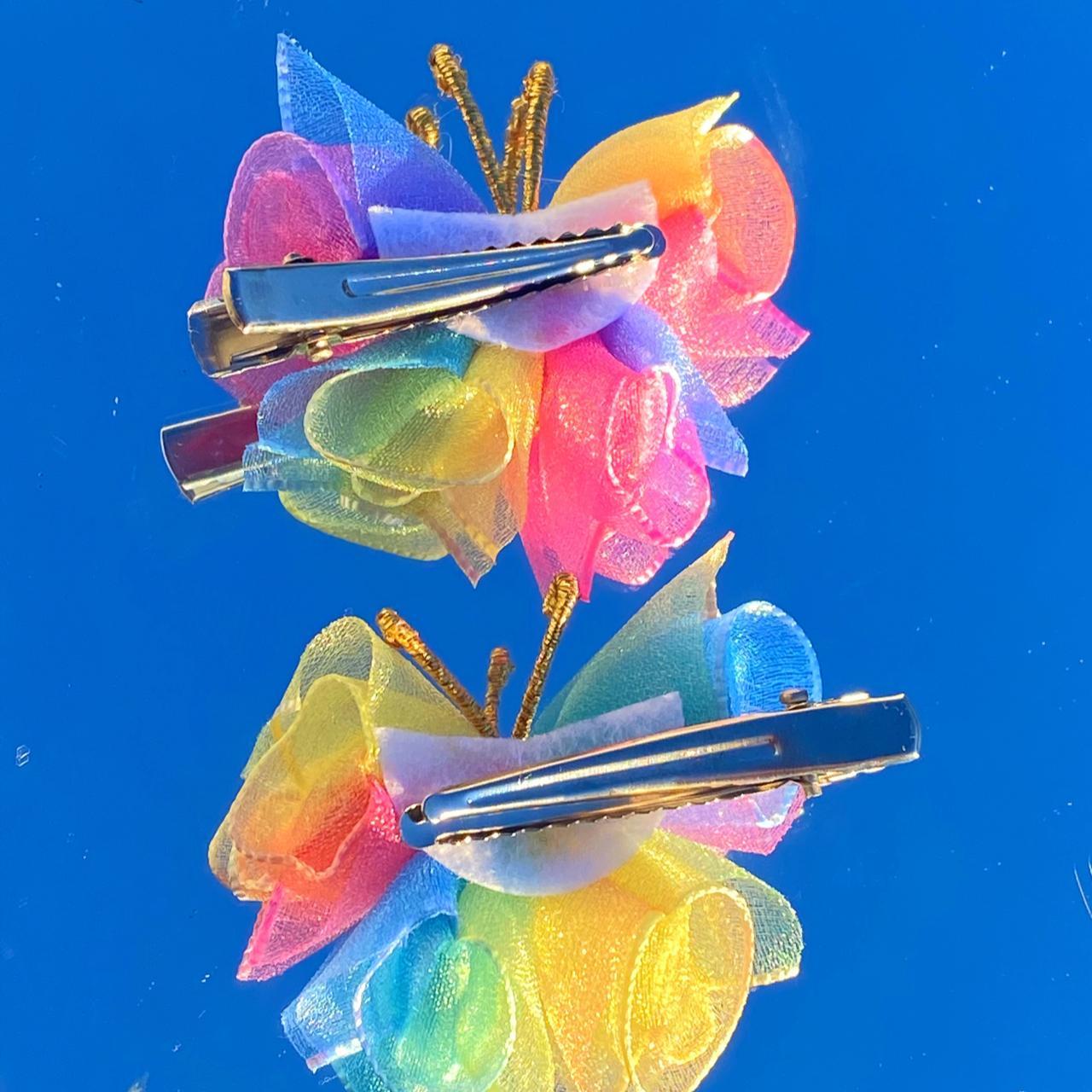 rainbow pastel butterfly clips!!! perfect condition... Depop