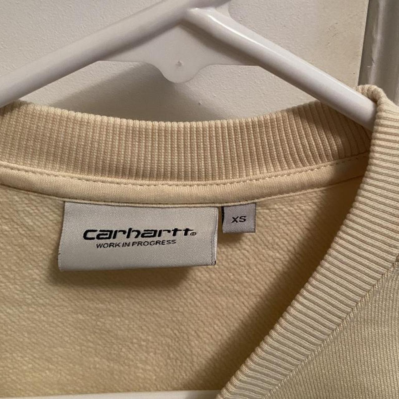 Carhartt WIP Women's Cream Sweatshirt | Depop