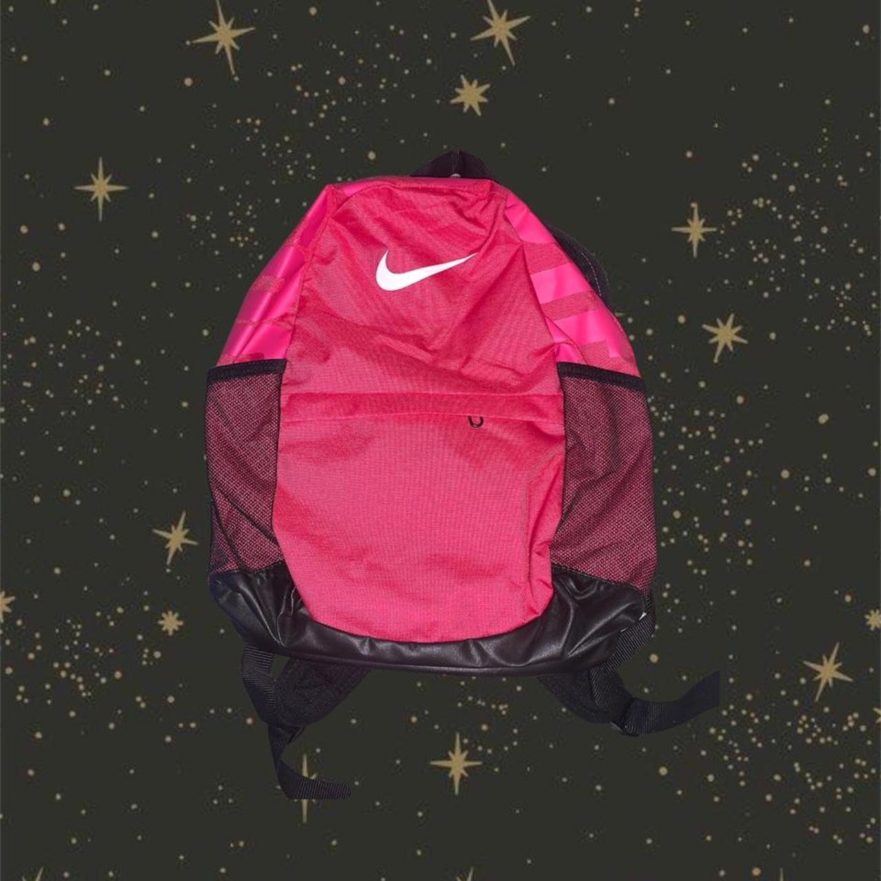 Black Hot pink NIKE medium size backpack. Depop