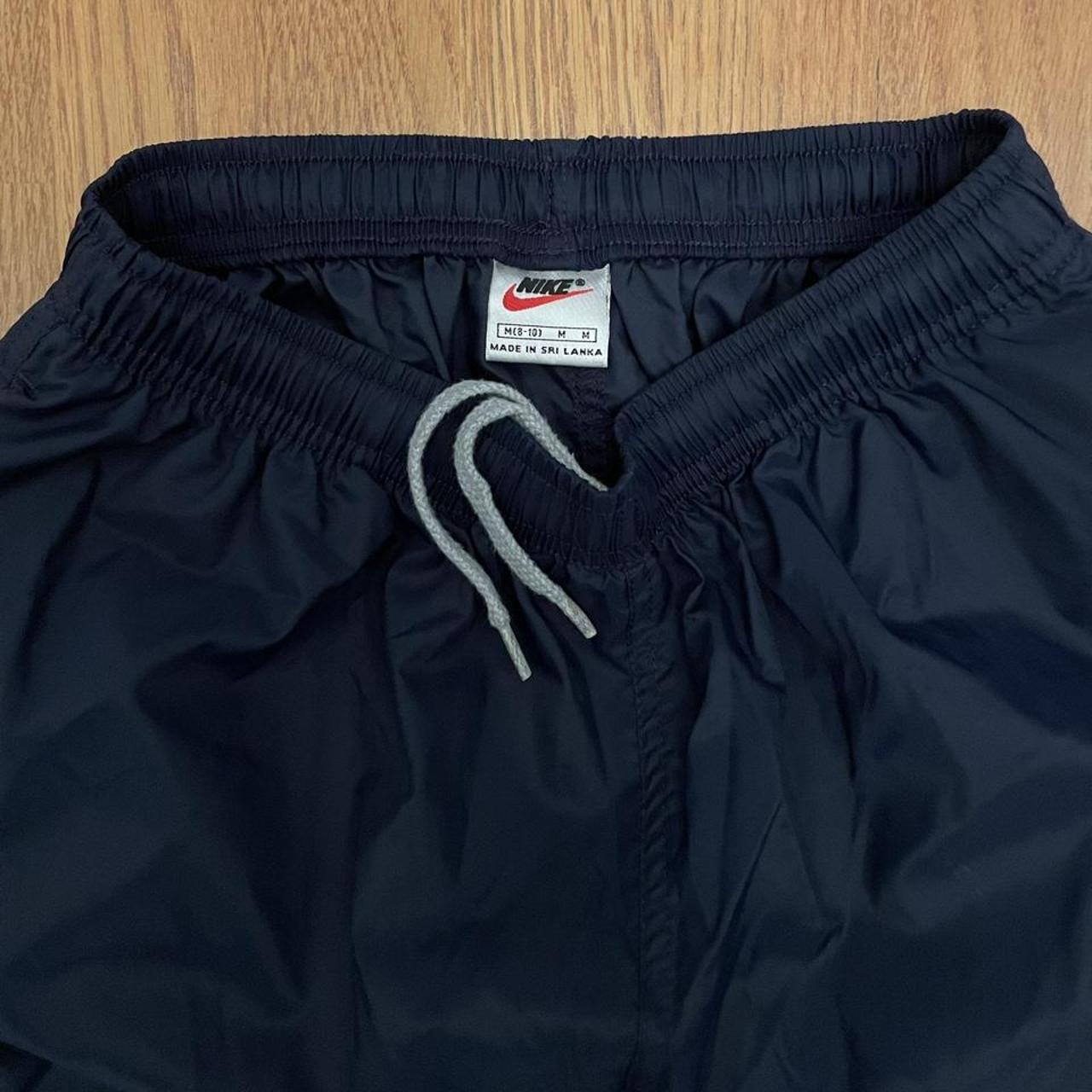 mens nike swishy pants