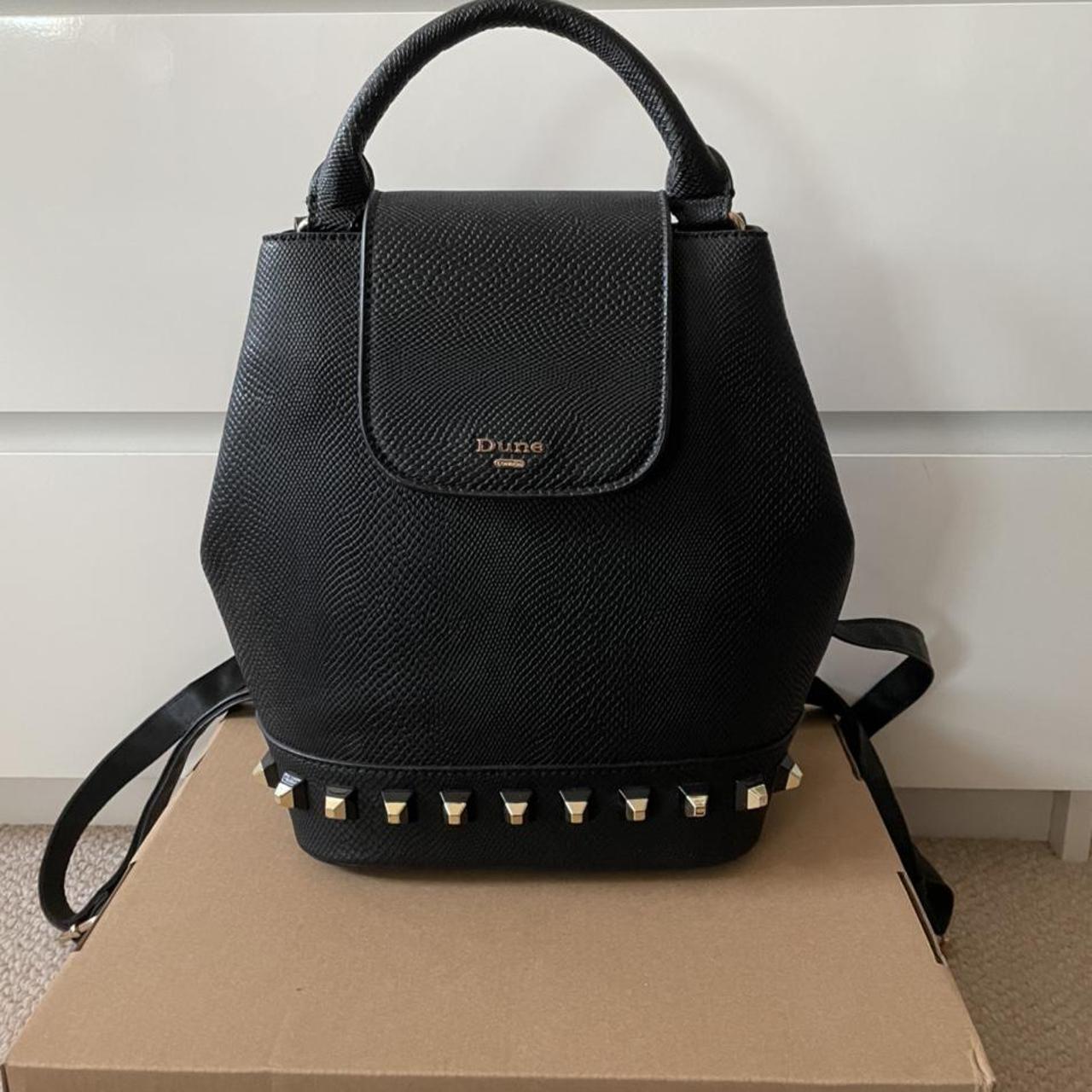 Black Dune Backpack with studs and adjustable... Depop