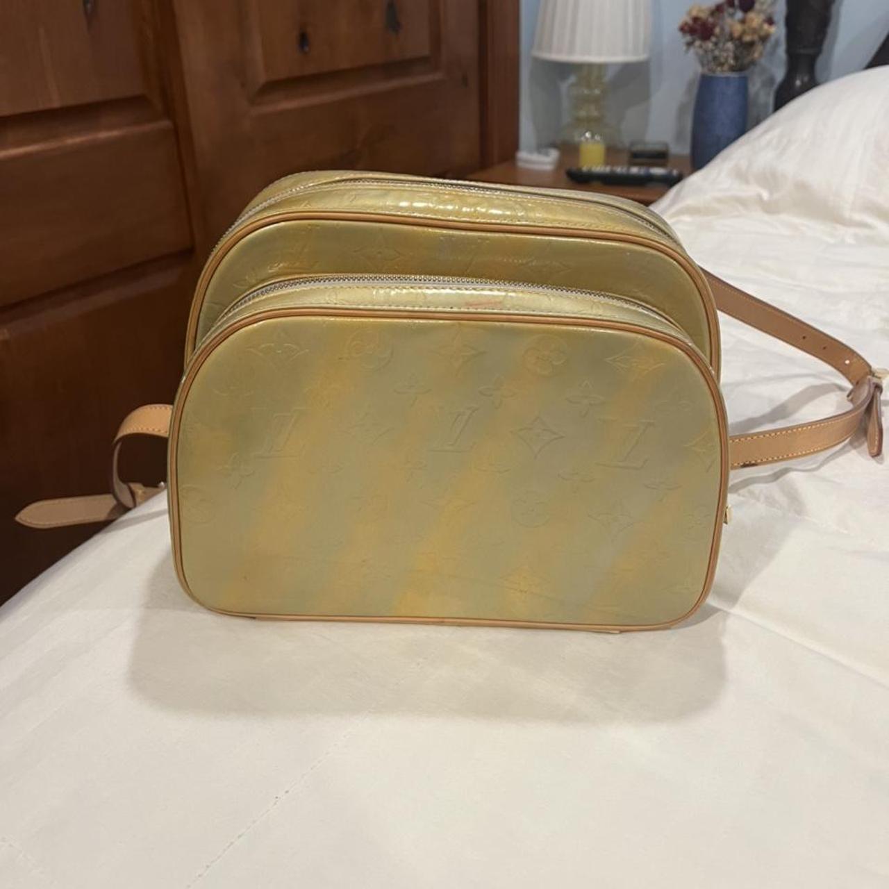 Louis Vuitton backpack. The bottom of the bag needs - Depop