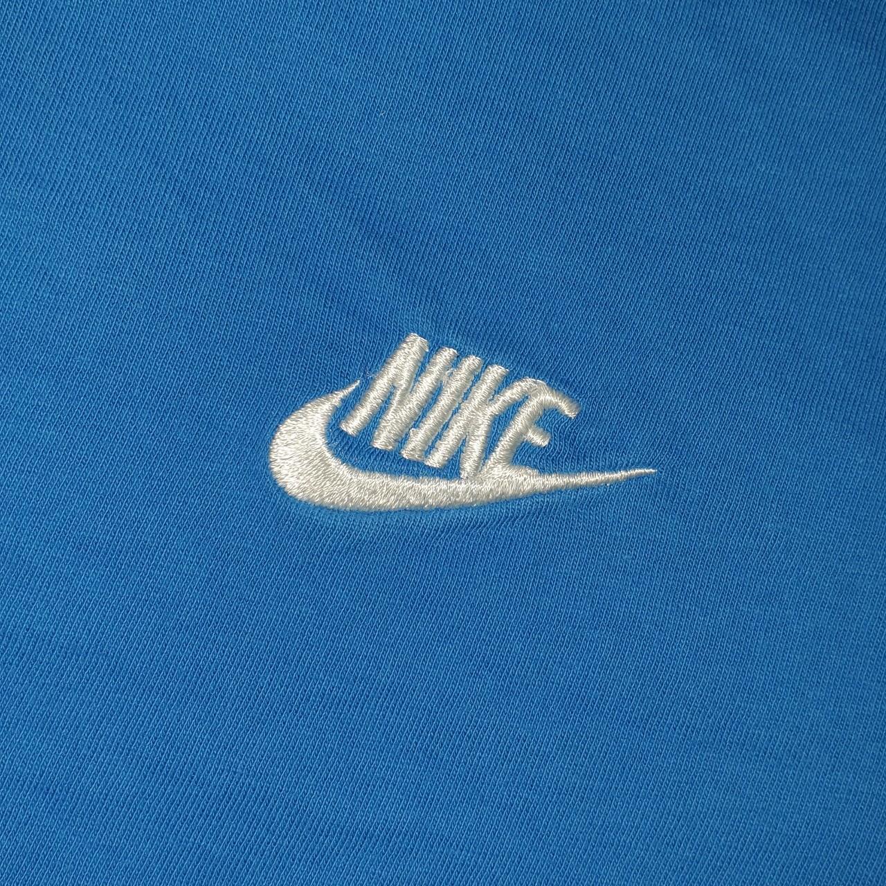 diffused blue nike shirt
