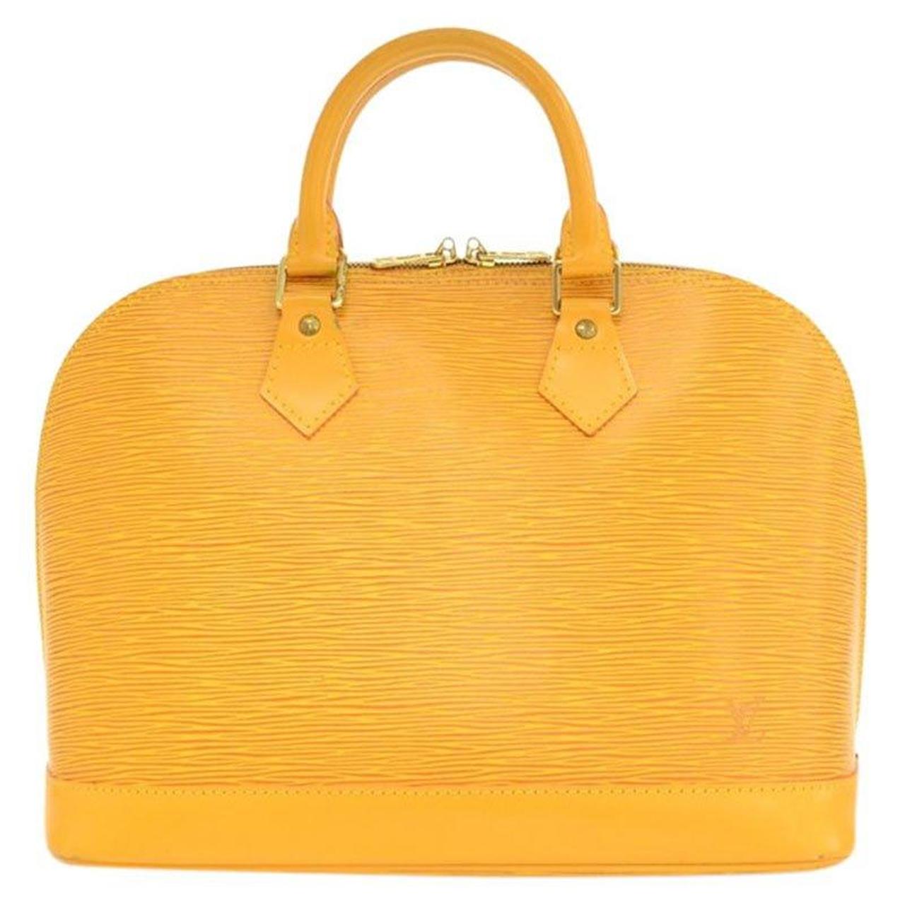 Vintage Louis Vuitton Epi Alma Bag in Yellow. Mint - Depop