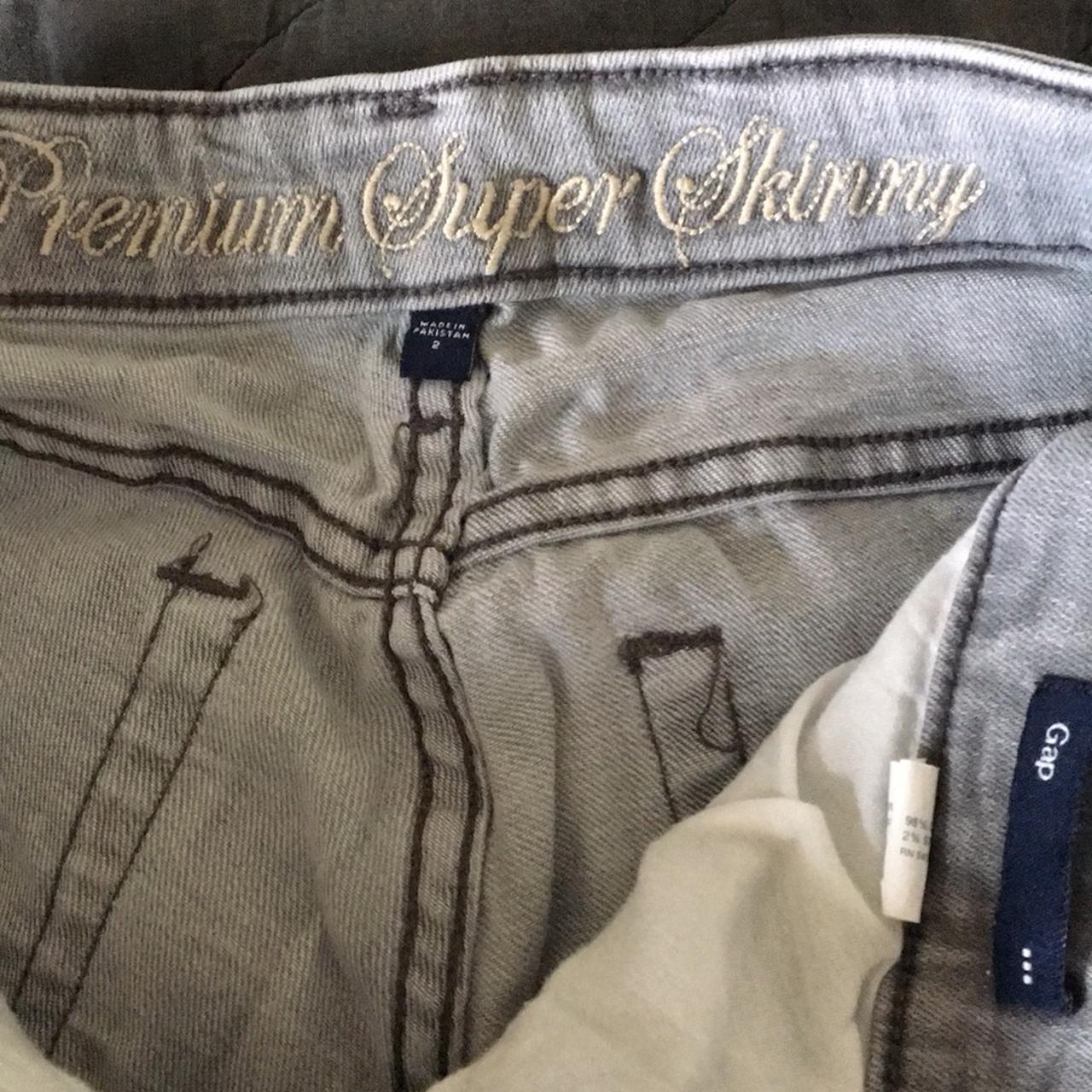 Size 2 grey skinny jeans from Gap. Super stretchy.... - Depop