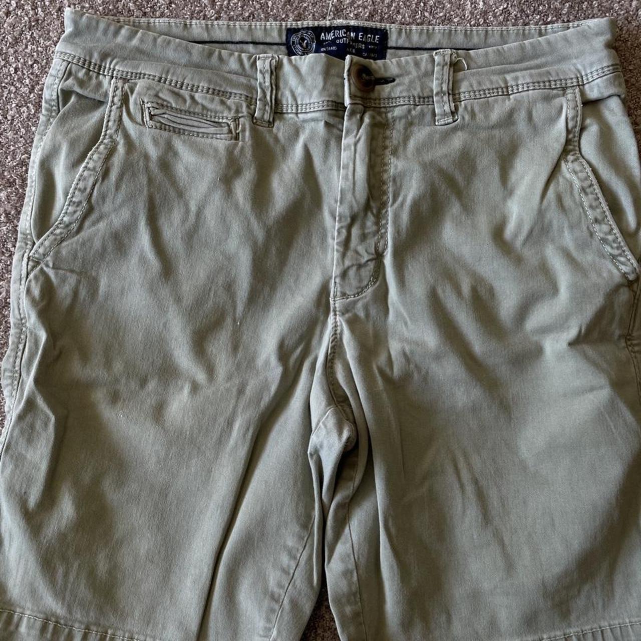 Green slim cargo shorts from American eagle. Slight... - Depop