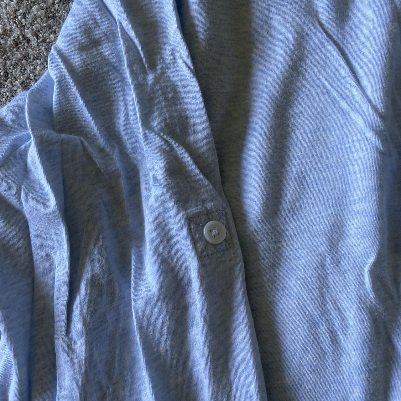 H&M baby blue Henley with arm buttons. Great... - Depop