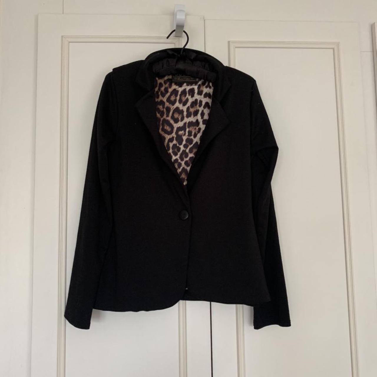 black blazer with leopard print lining
