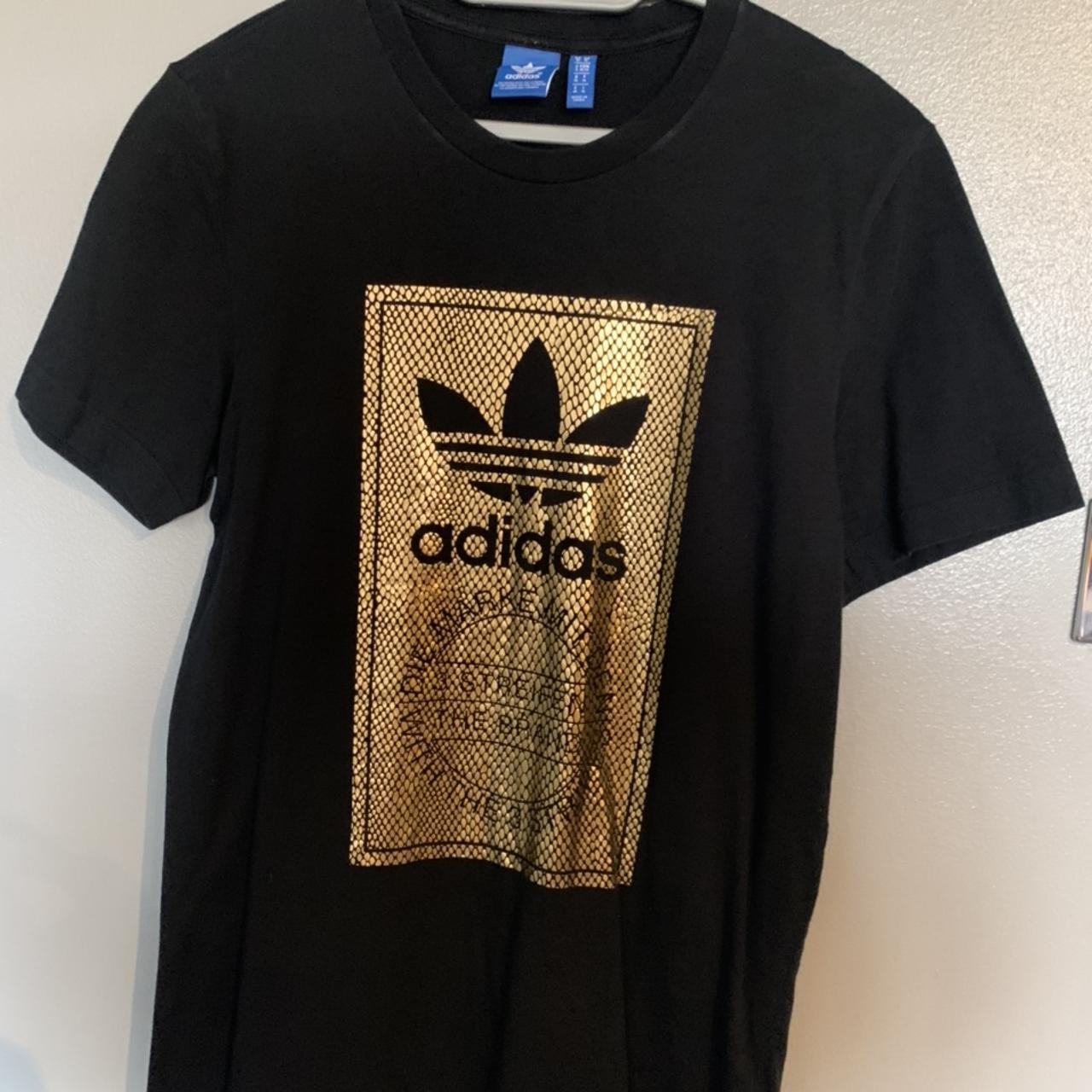 Adidas black and gold t shirt Depop