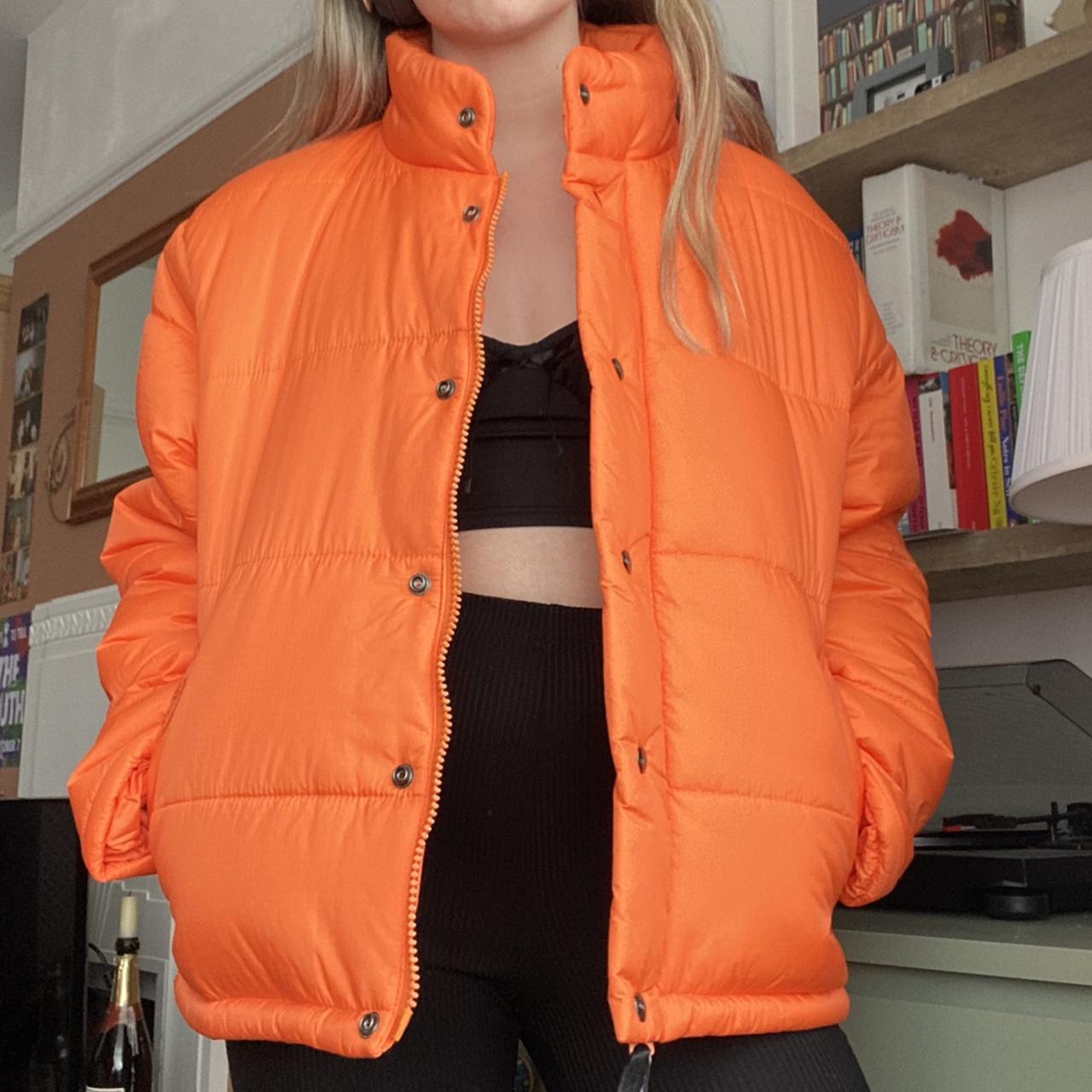 neon orange bubble coat