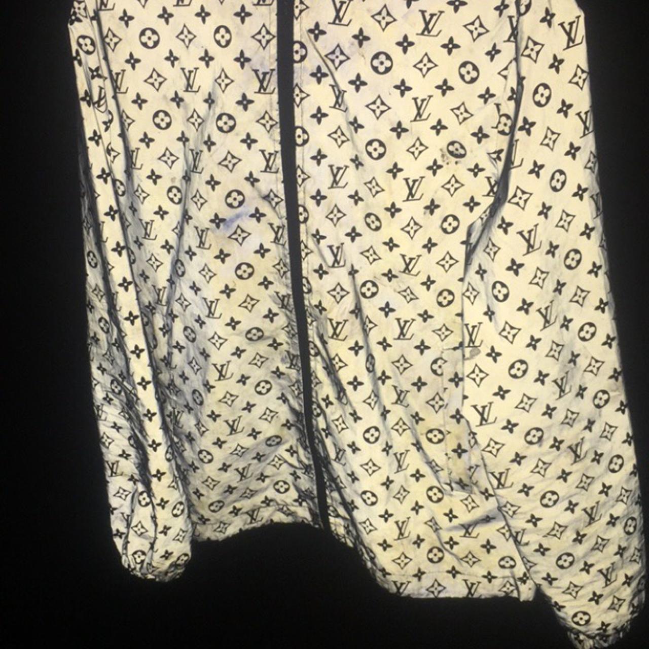 Louis Vuitton reflective jacket hmu for prices. - Depop