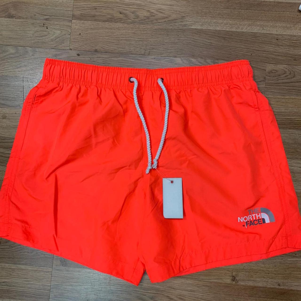 Mens North face shorts orange colour coming... Depop