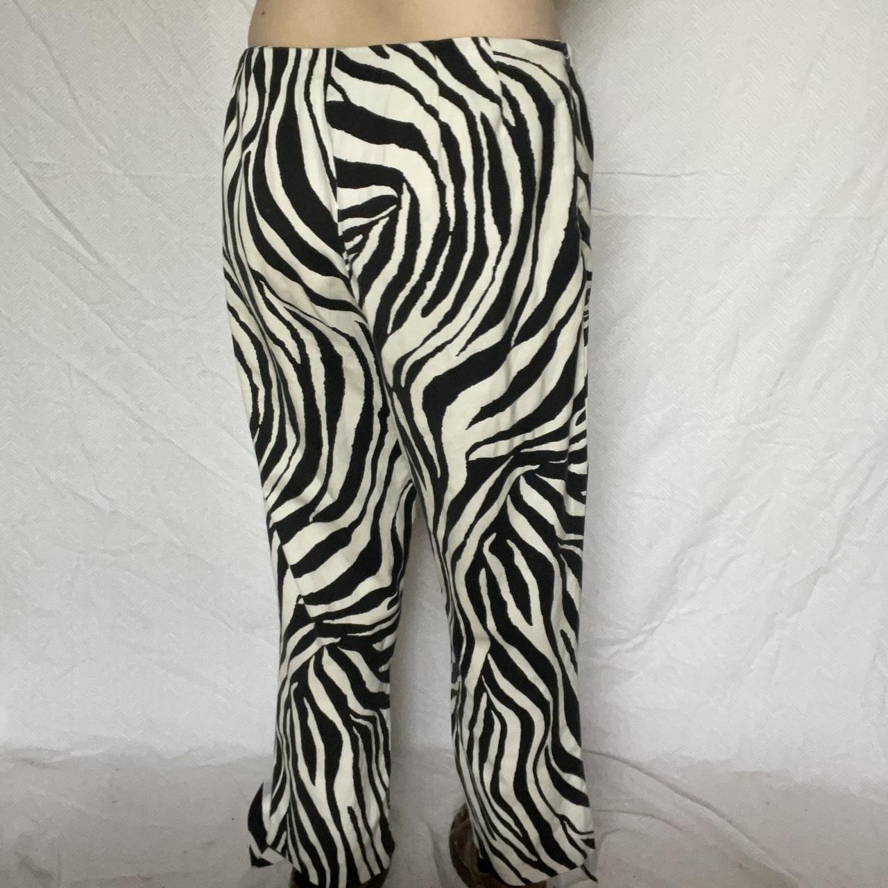 Funky zebra pants! With a fun flare/ slit ankle... - Depop