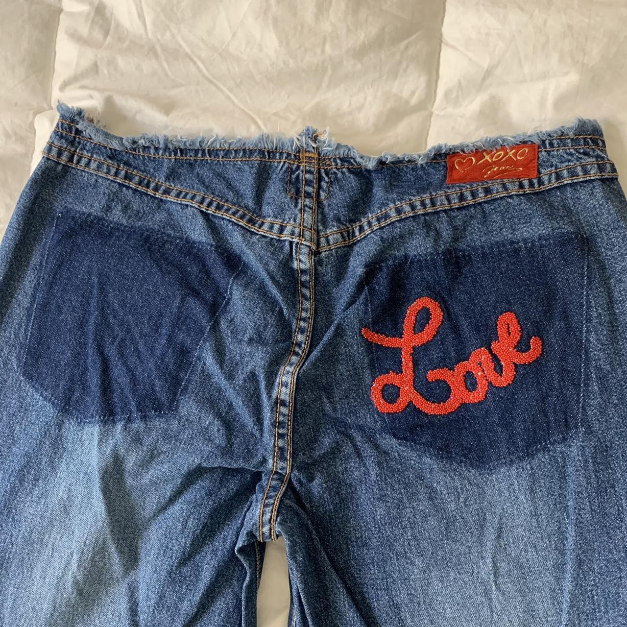 Vintage, early 2000s low rise flare jeans with red... - Depop