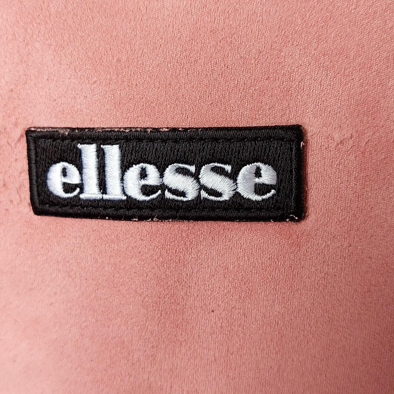 Pink Ellesse Cropped Jacket Size 8. Great used... Depop