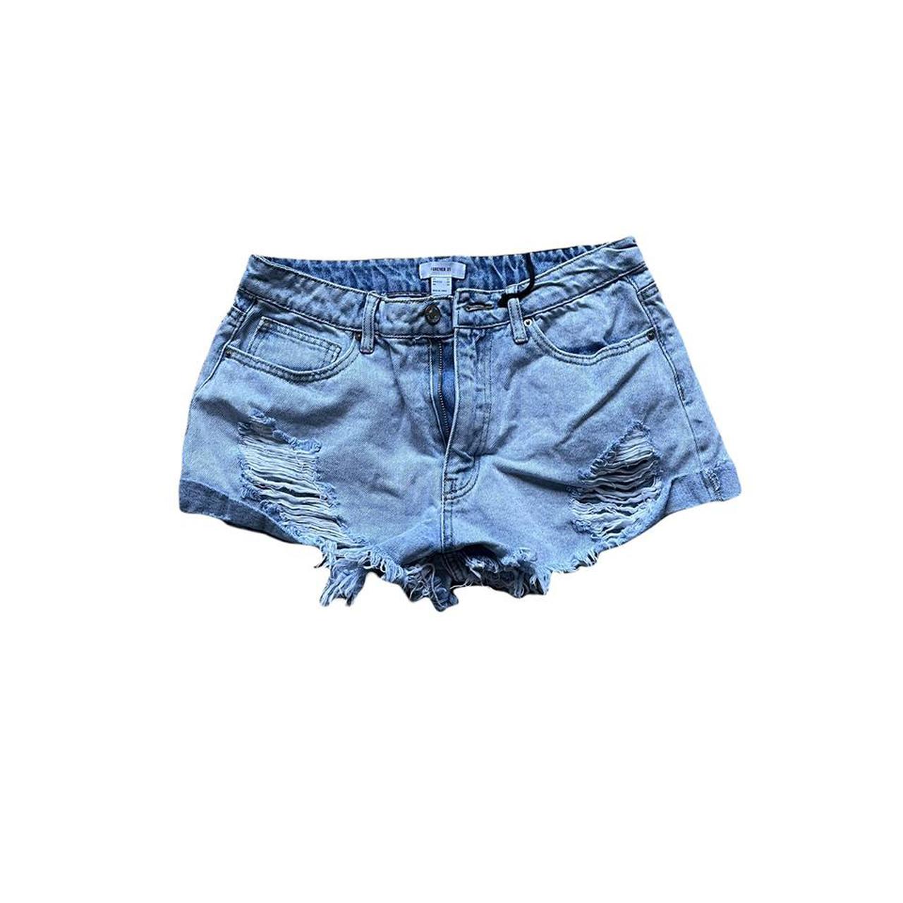 light blue ripped shorts