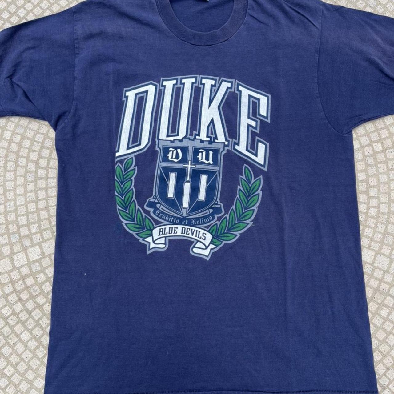 ncaa-men-s-navy-and-grey-t-shirt-depop