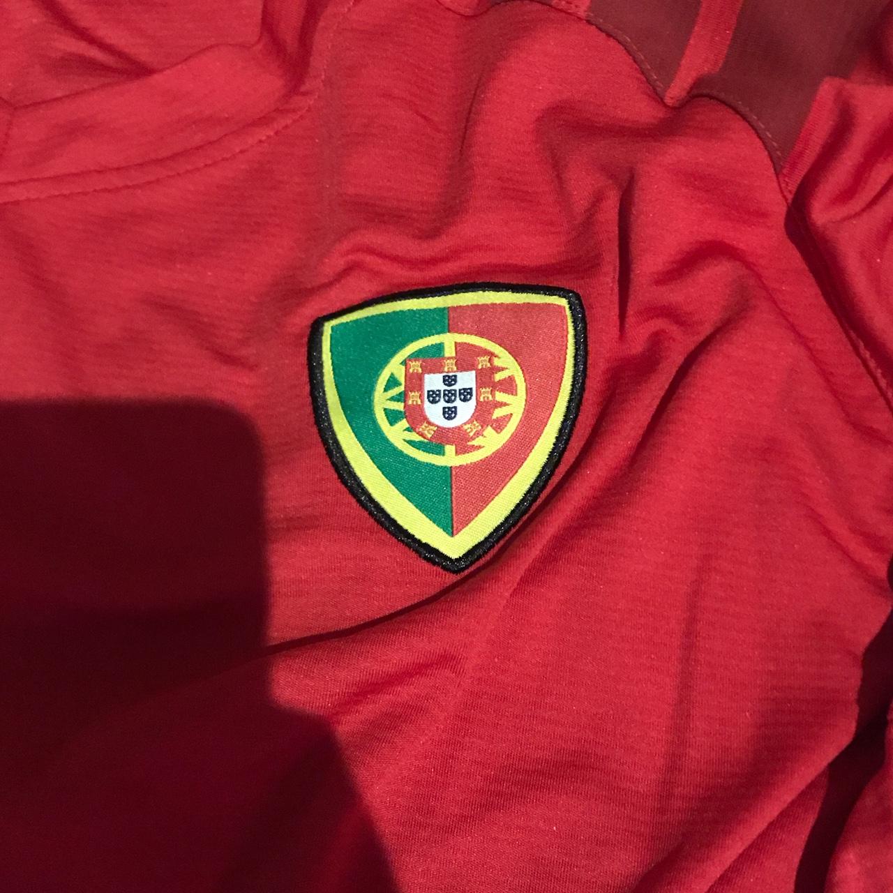 Cristiano is preying you buy this cracking Portugal home shirt