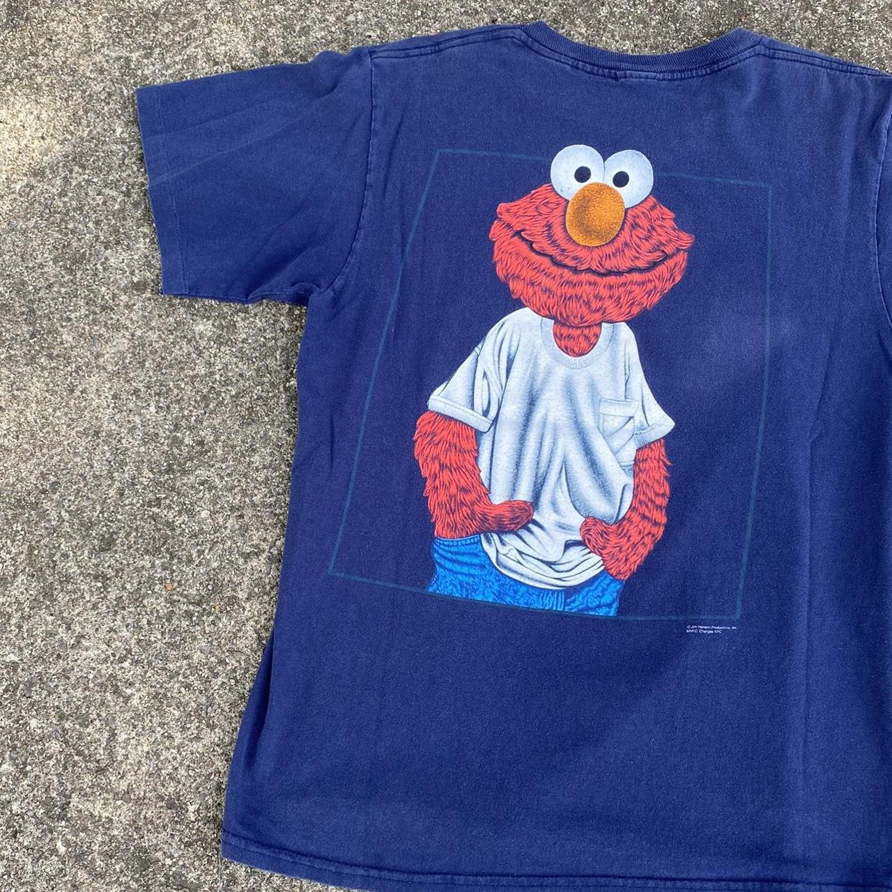 A vintage 90s Sesame Street Elmo Wear Tee Gently... - Depop