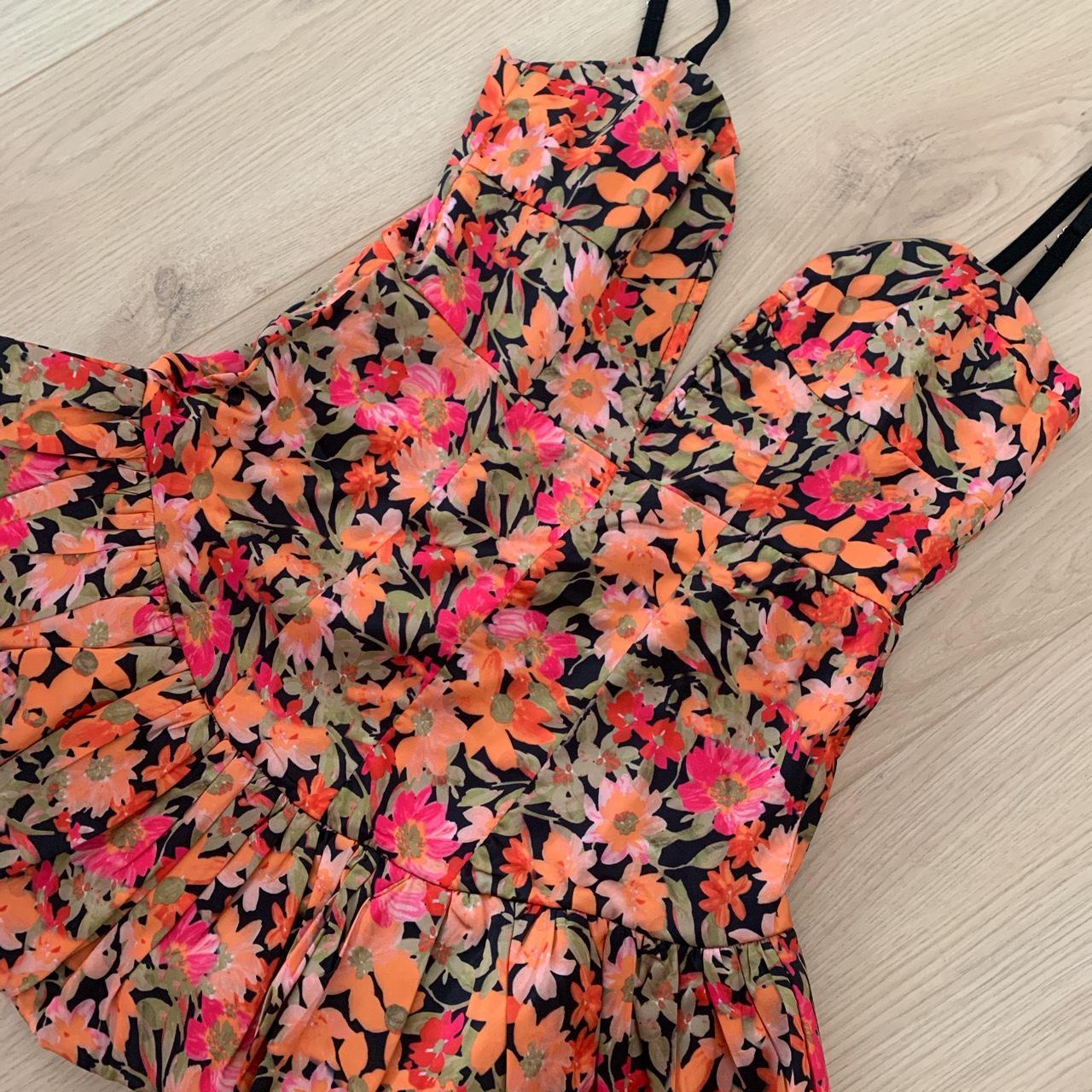 Floral ruffle mini dress from beaut boutique , size... - Depop