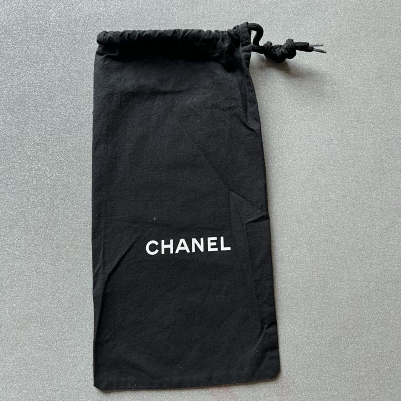 Chanel dust hot sale bag white