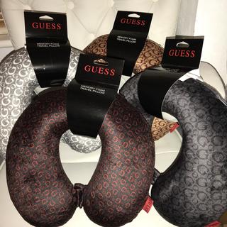 Guess Travel Pillows for sale. Comes in four Depop