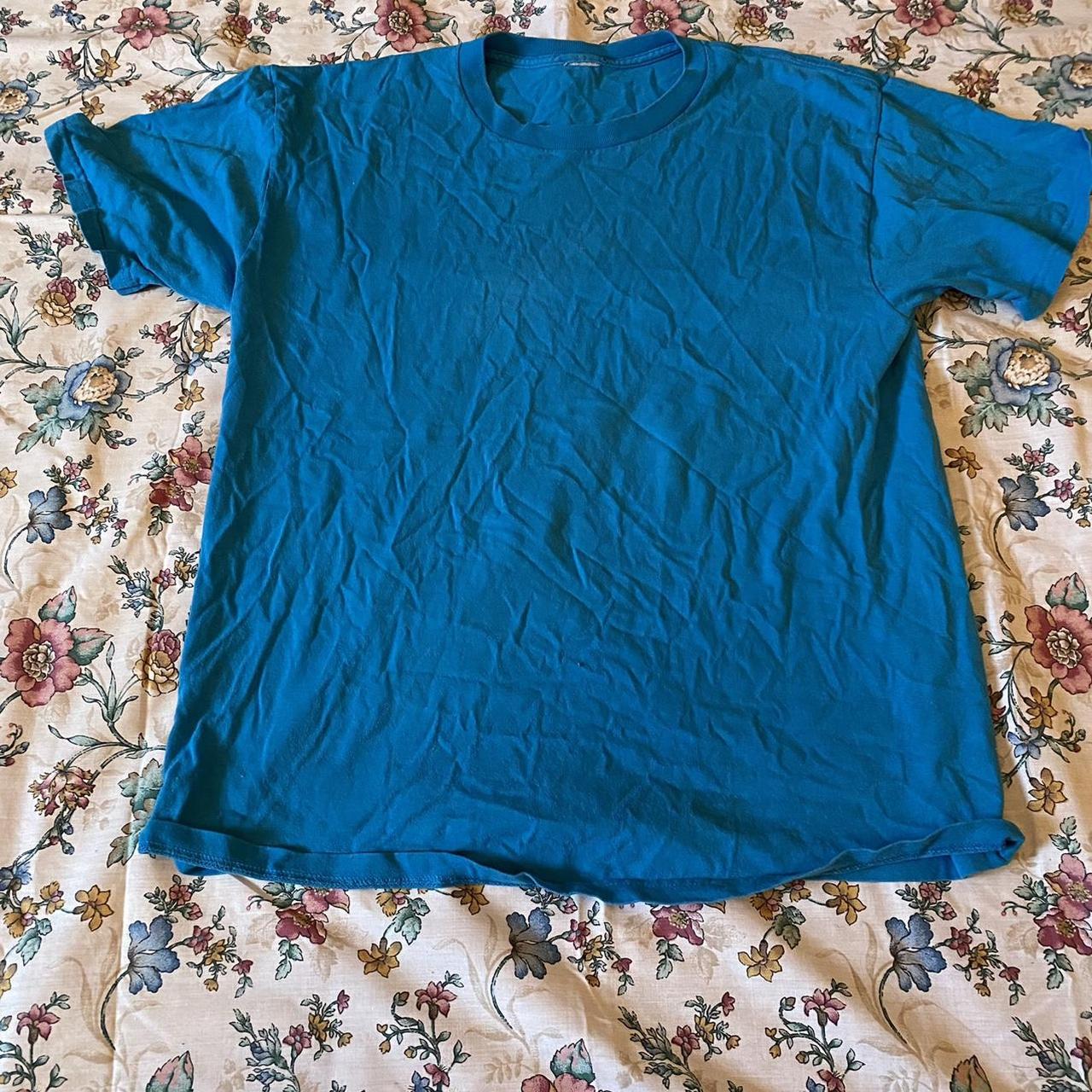plain blue t shirt! no tag but fits about about a... - Depop
