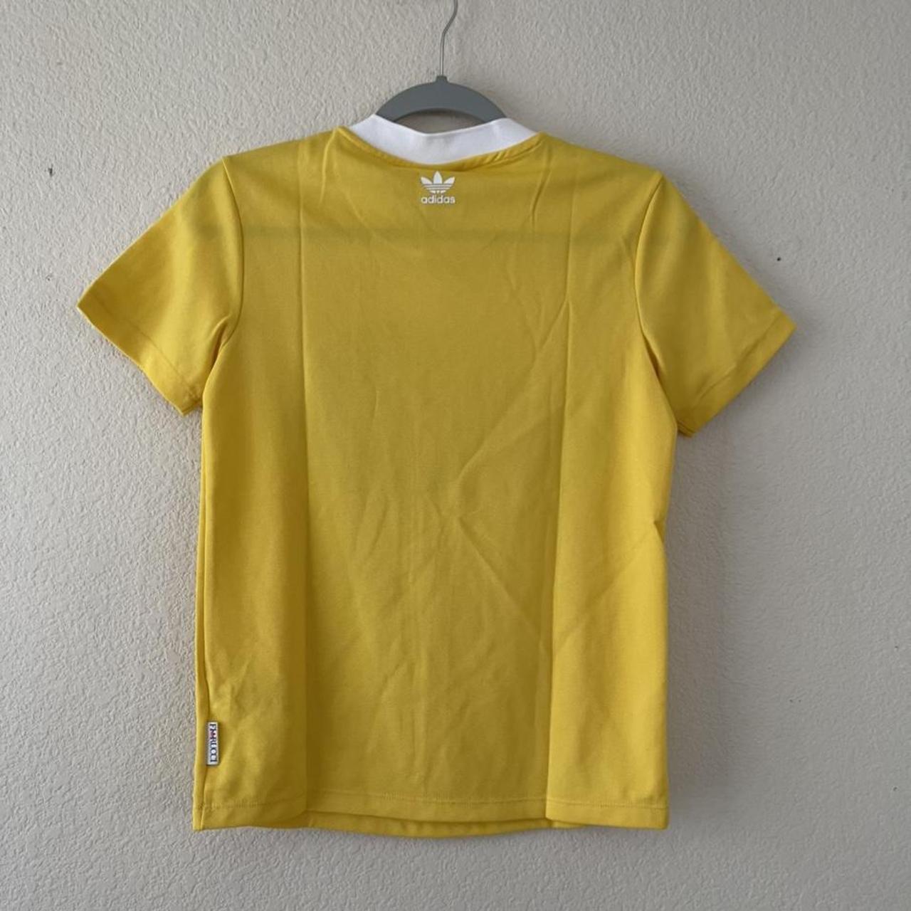 NWT fiorucci x adidas yellow t shirt Has a jersey... - Depop