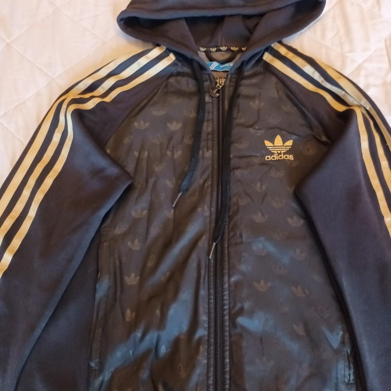 Black and gold Adidas track top,womens, excellent... - Depop