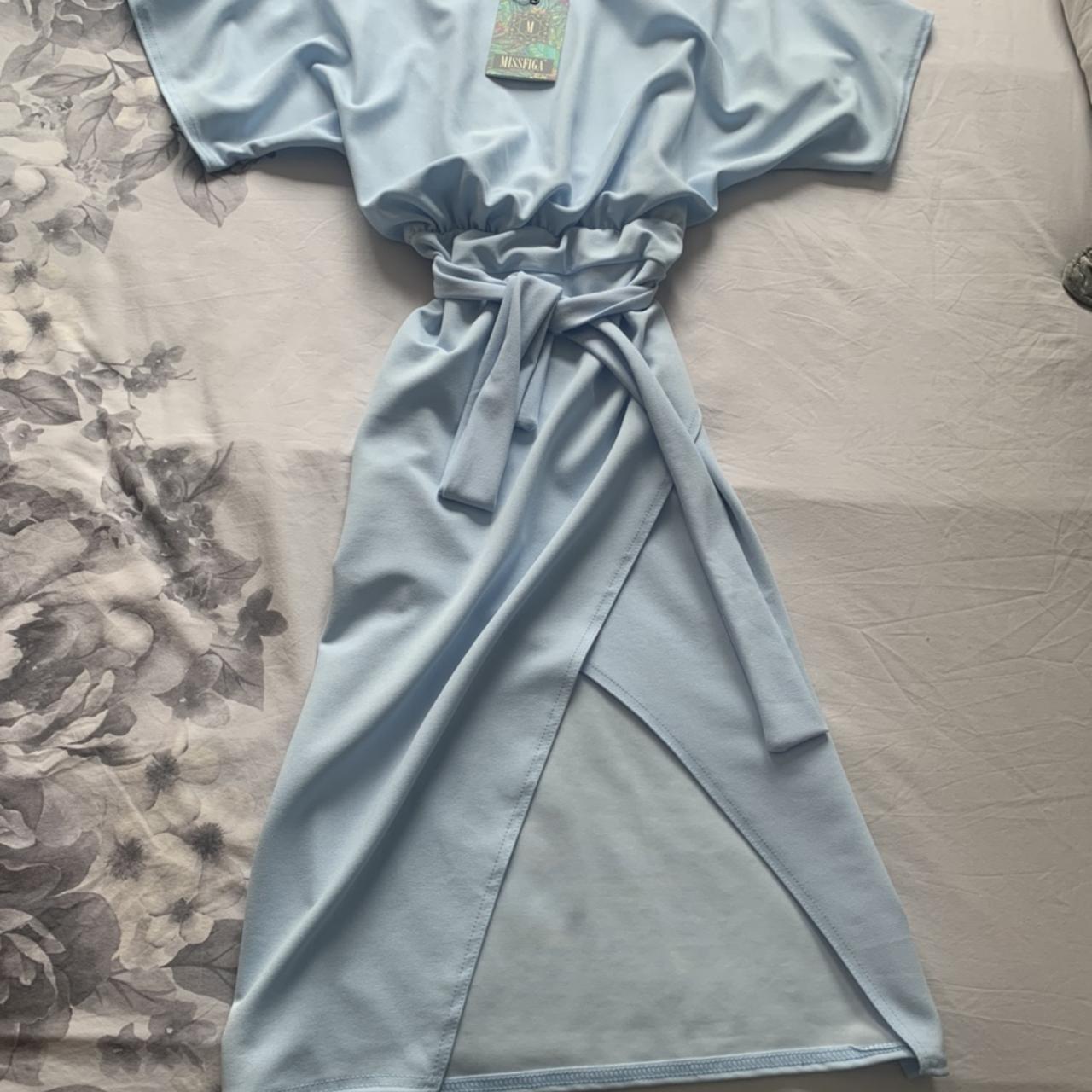 Missfiga Judith Baby blue wrap front batwing dress Depop