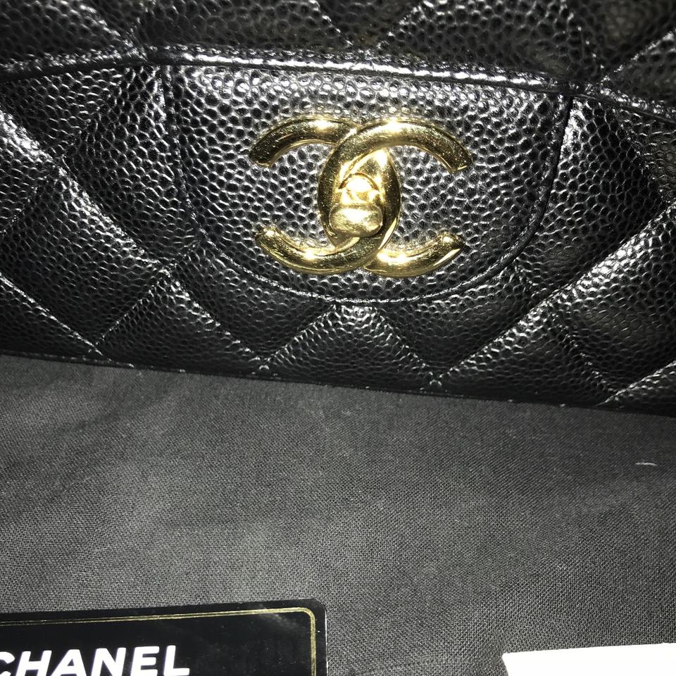Chanel classic flap bag Maxi caviar with gold - Depop