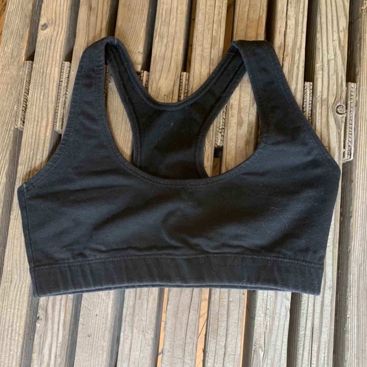Basic low cut black sports bra . Marked size large . - Depop