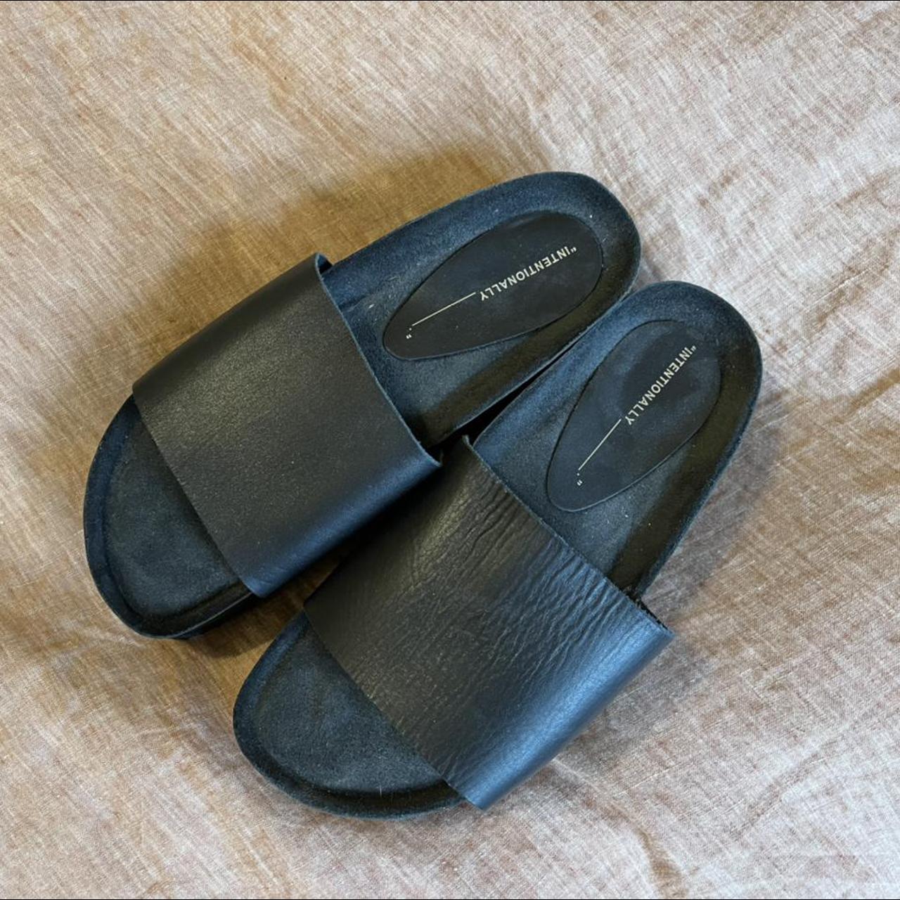 Intentionally Blank Women's Black Slides Depop