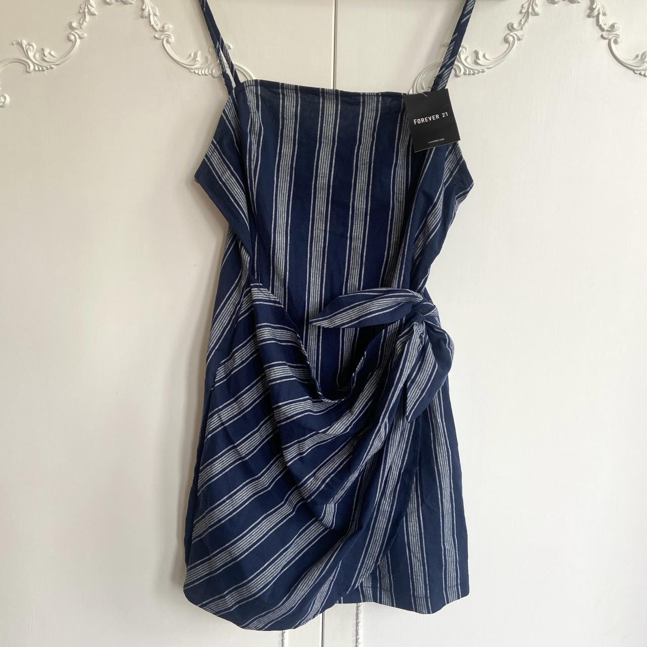 Mini dress. Blue and white mini dress in stripe... - Depop