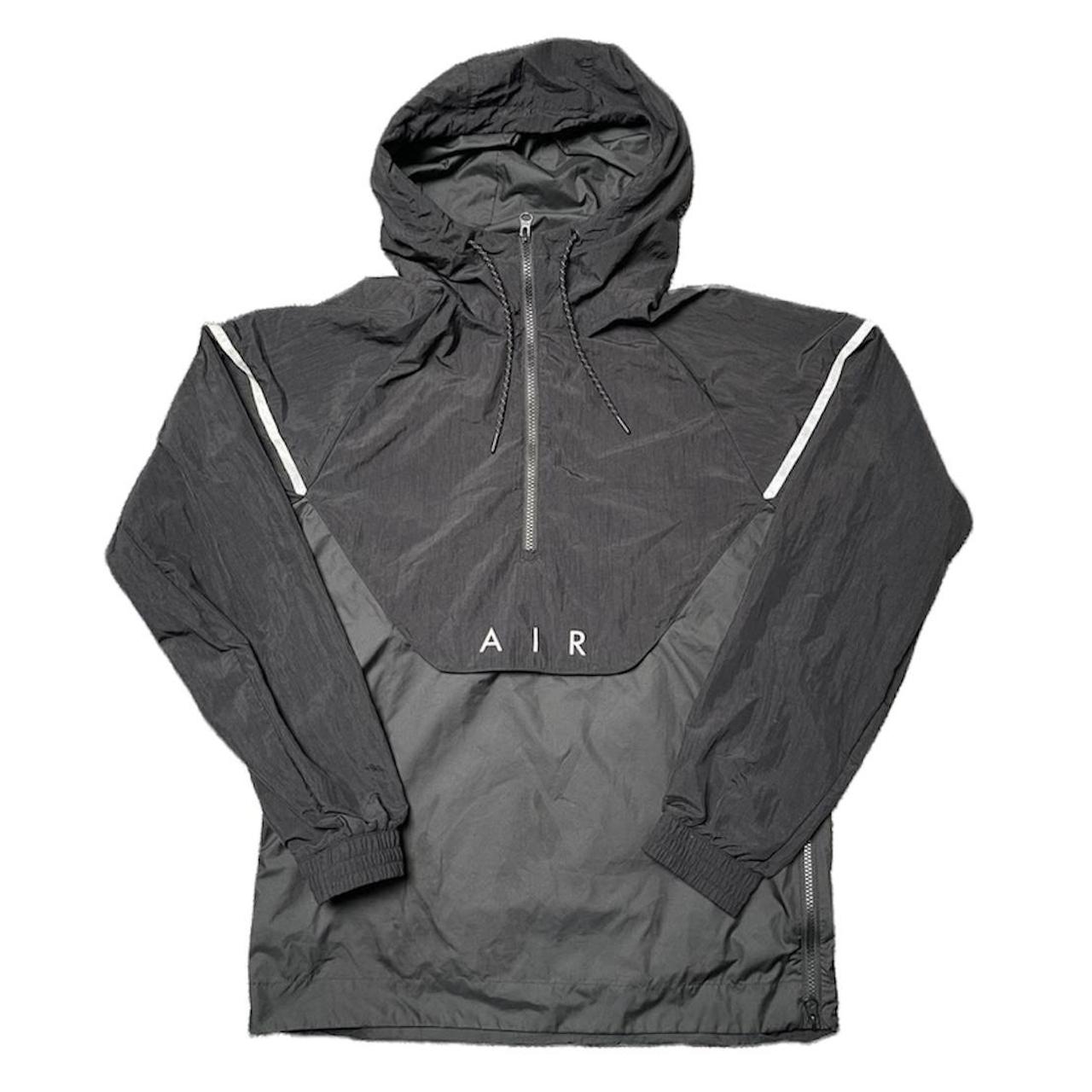 black and silver nike windbreaker
