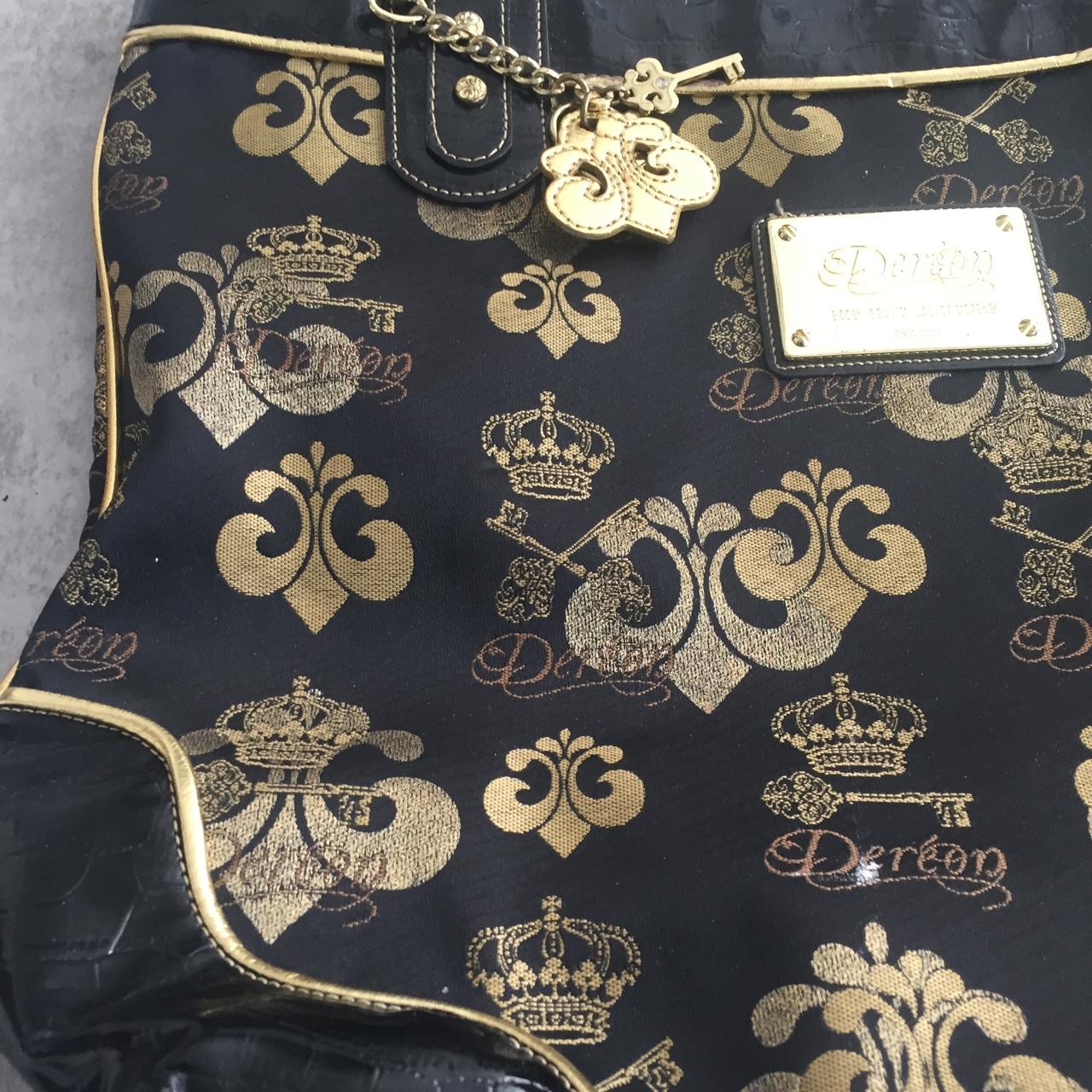 Best Dereon Purse Black And Gold for sale in Detroit, Michigan for 2023