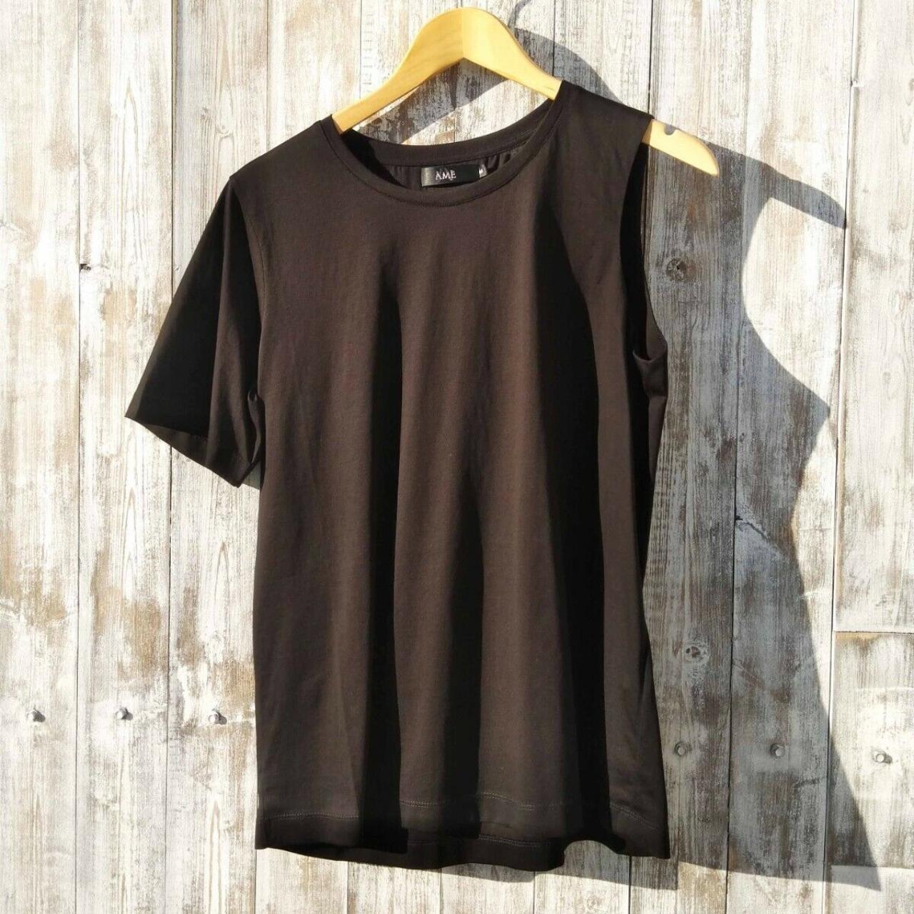 Anthropologie Women's Black T-shirt | Depop