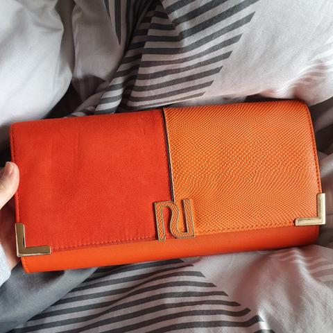 Orange 2025 clutch bag