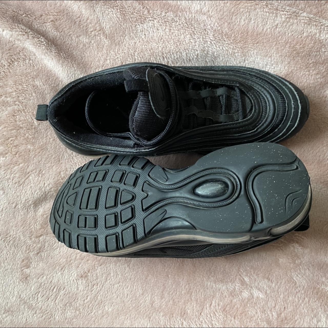 97s triple black