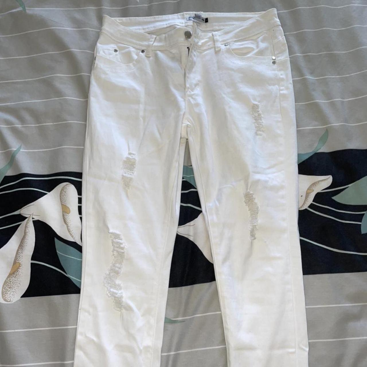 Ripped white denim jeans size 11 Minor stain - Depop